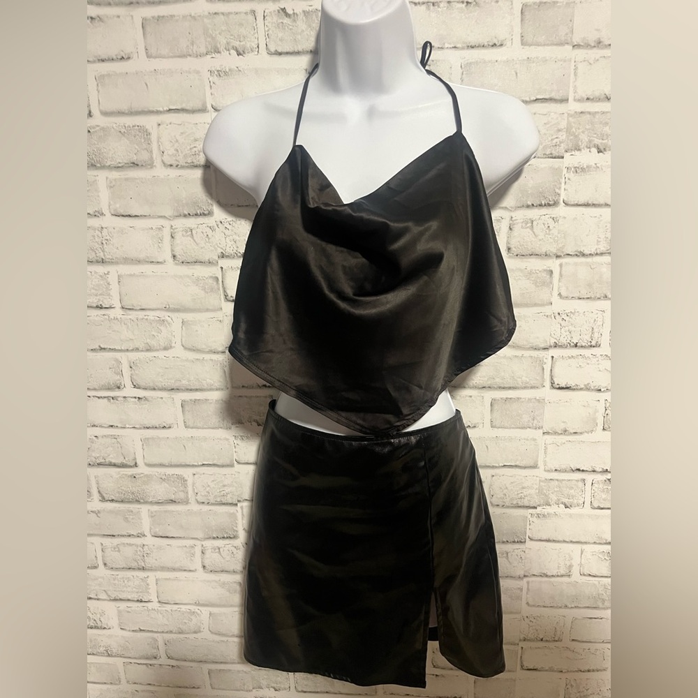 Black halter back top and leather skirt